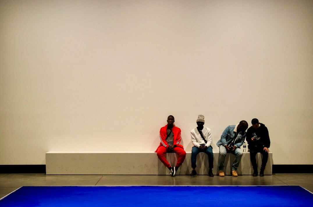 Panel discussion with four speakers on stage