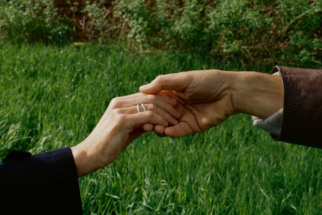 Public and private sector representatives shaking hands